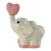 Elefantino Cuore Rosa in Ceramica, ceramica bianca lucida con cuore rosa, ideale per nascite e battesimi.