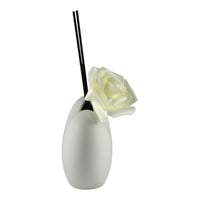 Profumatore Pure Heart con Rosa Bianca in ceramica bianca e bacchetta nera, elegante e moderno.